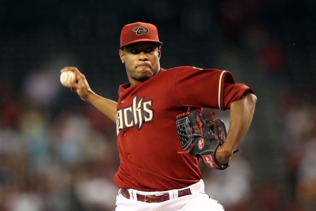 Jon- Jay-, Edwin- Jackson- Signed- by- Diamondbacks 